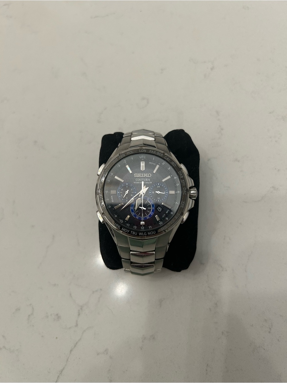 Seiko Silver Stainless Steel Men's Watch with Black and Blue Dial Accents